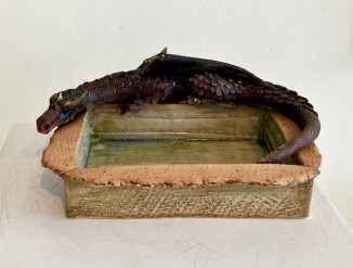 Black Dragon on a Textured Dish